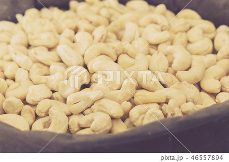 Image of white cashew in container 46557894