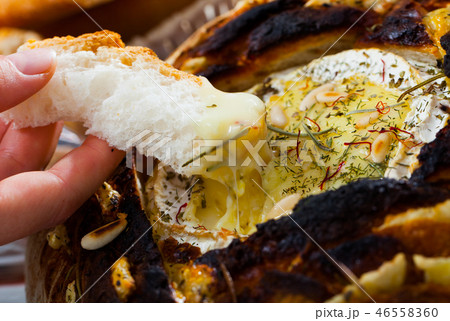Camembert fondue in bread bowl 46558360