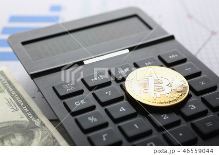 The bitcoin lies on the keyboard of the black 46559044