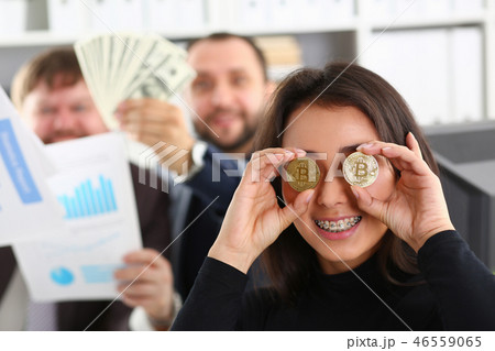 Young happy smiling chinese woman holding 46559065