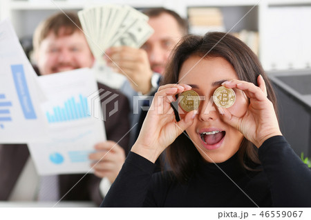 Young happy smiling chinese woman holding 46559067