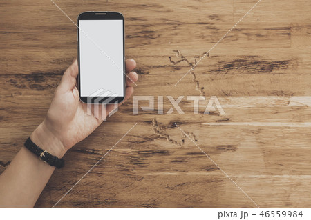 Top view of hands holding tablet table background 46559984