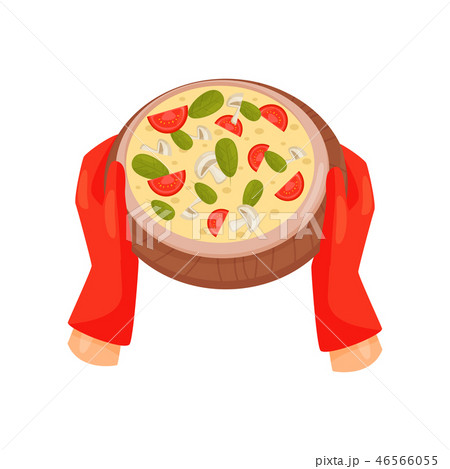 Hands in heat resistant gloves holding freshly prepared pizza with tomato, mushrooms and basil 46566055