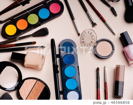 Women's cosmetics and makeup set on pink background. Top view Women's cosmetics and makeup set on pink background. Top view 46566856