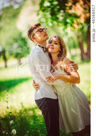 Young beautiful couple on a blurred background 46568917