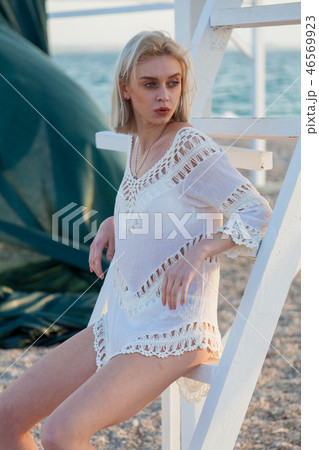 beautiful fashionable woman in underwear and a hat on the coast of the Ocean Beach 46569923