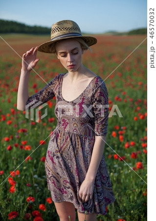 woman farmer with red flowers fashion portrait woman farmer with red flowers fashion portrait 46570032