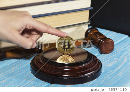 judge's hammer and bitcoin gold coin.  46574110