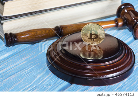 judge's hammer and bitcoin gold coin.  46574112