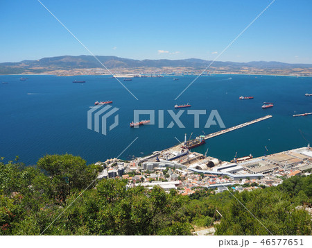 Container and cargo ships around Rock of Gibraltar 46577651