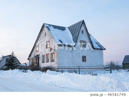 Concrete cottage in winter time 46581749