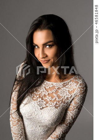 Gorgeous brunette in lace dress waist up portrait Gorgeous brunette in lace dress waist up portrait 46581848