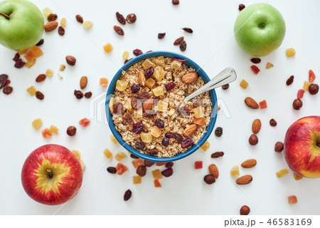 Reduce callories. Top view of muesli bowl with fresh fruits. Reduce callories. Top view of muesli bowl with fresh fruits. 46583169