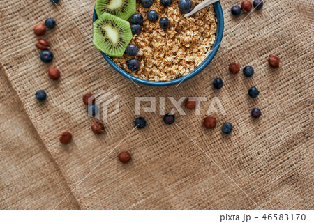 Cropped photo of muesli bowl with fruits. Healthy snack or breakfast in the morning. 46583170