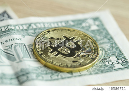 Golden Bitcoin coin on wood background 46586711
