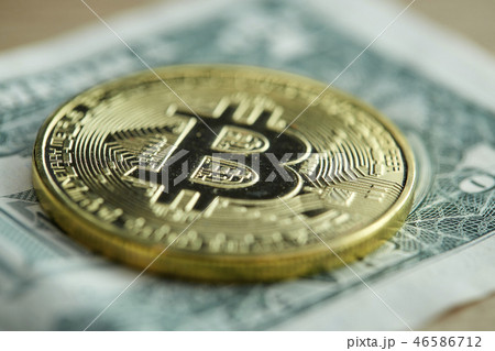 Golden Bitcoin coin on wood background Golden Bitcoin coin on wood background 46586712