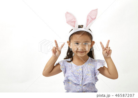 Girl acting as a little easter day 46587207