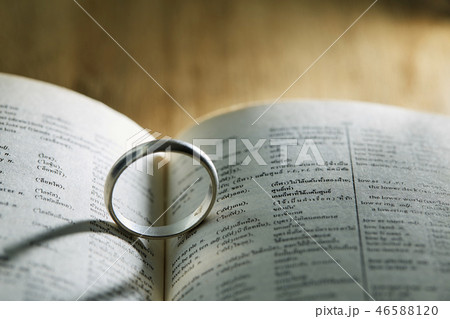 Silver ring on pages book 46588120