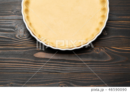 shortbread dough for baking quiche tart in baking form 46590090