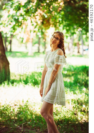 Beautiful young girl on natural background 46592170