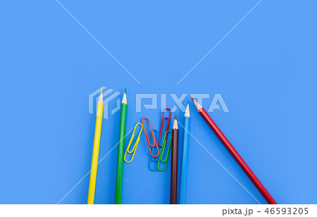 School stationery pencils clips on blue background School stationery pencils clips on blue background 46593205