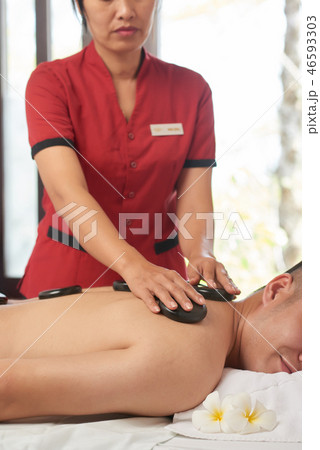 Stone therapy at spa salon 46593303