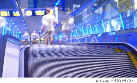 long escalators in modern mall, blur background 46594557