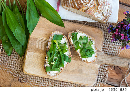 Two slices of sourdough bread with wild garlic 46594686
