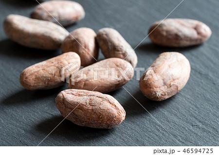 Raw cacao beans on a dark background 46594725