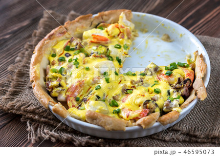 Seafood pie with saffron cream sauce Seafood pie with saffron cream sauce 46595073