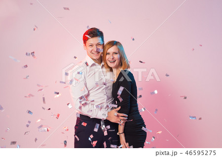 New Year, Saint Valentine's day and holidays concept - Cheerful joyful young people standing and 46595275