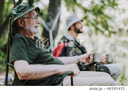 Joyful elderly man enjoying his fishing weekend 46595455