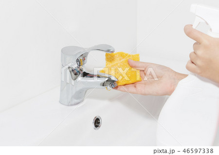 cleaning the faucet cleaning products.  46597338