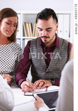 Group of people sit in office deliberate problem 46604776