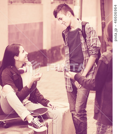Group of teenage friends chatting and having fun Group of teenage friends chatting and having fun 46606964
