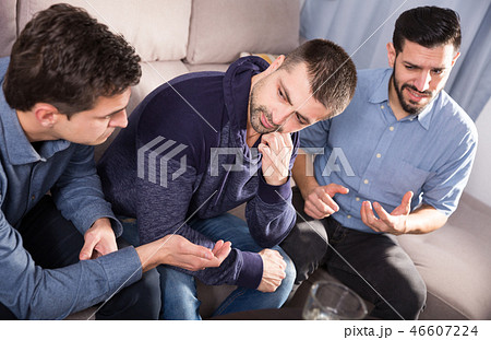 Upset friends talking on couch 46607224