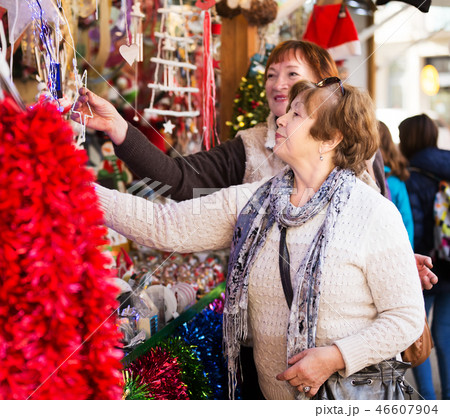Senior women at Christmas market 46607904