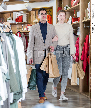 Couple is satisfied shopping and walking with package Couple is satisfied shopping and walking with package 46608034