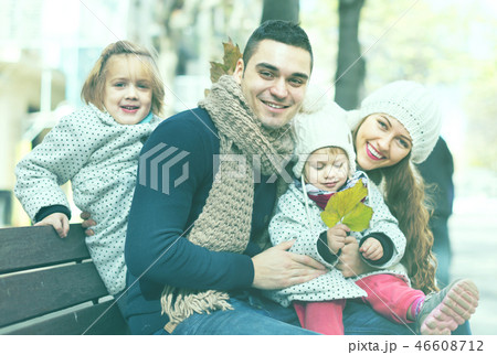 portrait of happy parents with children in autumn 46608712