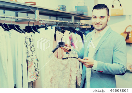 Male looking at expensive price Male looking at expensive price 46608802