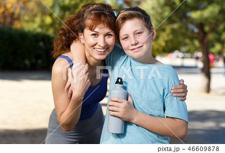 Family during break in outdoors workout Family during break in outdoors workout 46609878
