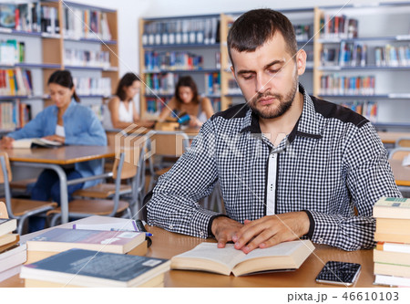 student working in university library student working in university library 46610103