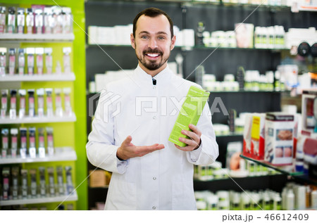 Male pharmacist in pharmacy Male pharmacist in pharmacy 46612409