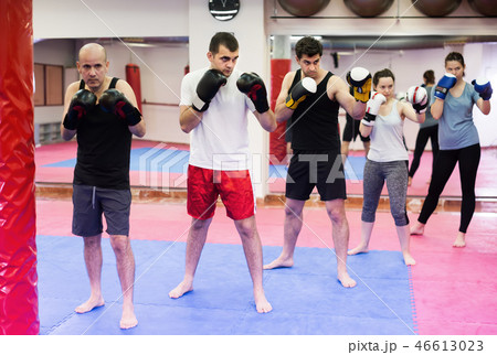 Group of active men training at box 46613023