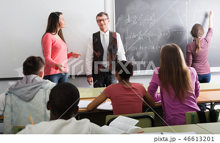 Man giving a math lesson Man giving a math lesson 46613201