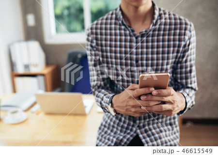 Anonymous Man Using Smartphone Anonymous Man Using Smartphone 46615549