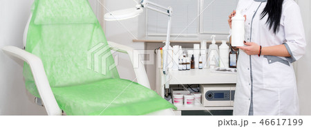 Woman beautician doctor at work in spa center. Young female professional cosmetologist. Female Woman beautician doctor at work in spa center. Young female professional cosmetologist. Female 46617199