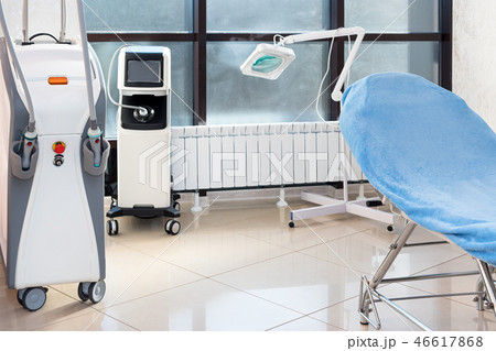 Cosmetologist cabinet with massage table in modern beauty saloon. Medical cabinet interior. 46617868