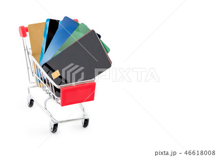 Shopping cart with credit cards on white background. Copyspace for text. 46618008