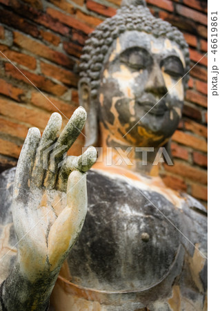 Old Buddha image selected focus on hand. Old Buddha image selected focus on hand. 46619861